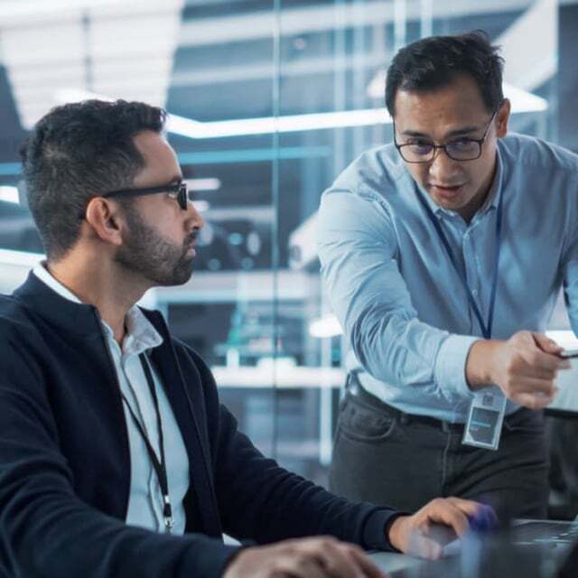 two-men-looking-at-computer-680x680-1